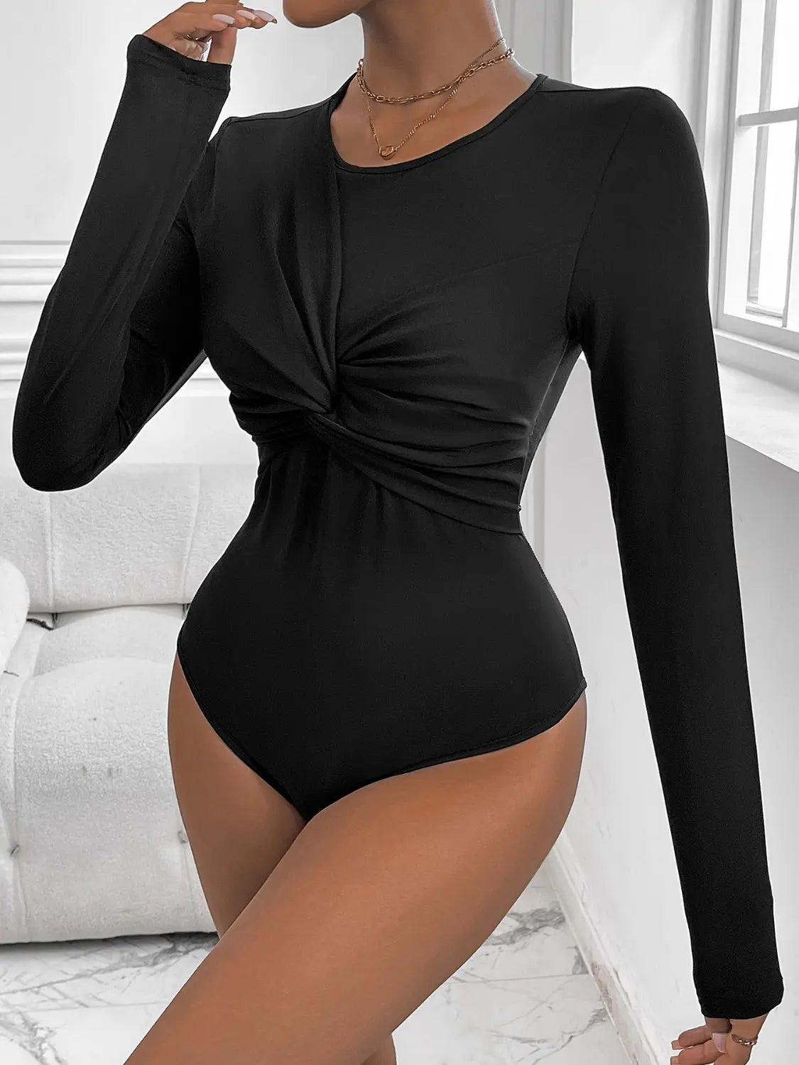 Perfee Twisted Round Neck Long Sleeve Bodysuit Trendsi