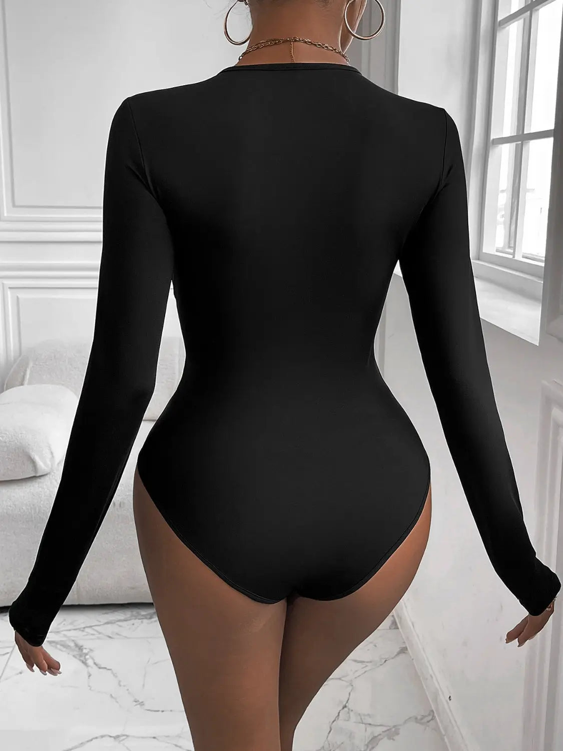 Perfee Twisted Round Neck Long Sleeve Bodysuit Trendsi