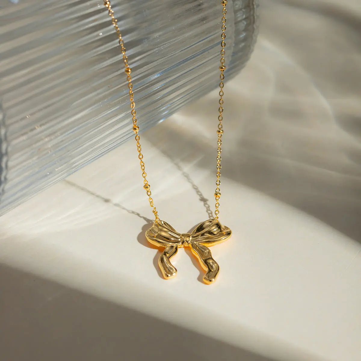 Stainless Steel Bow Pendant Necklace - GlossiChic Collectionjewelry