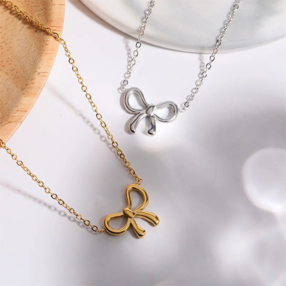 Titanium Steel Bow Pendant Necklace - GlossiChic Collectionjewelry