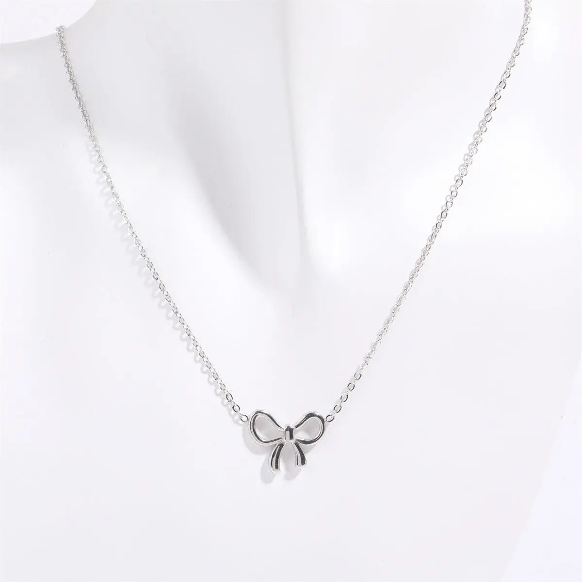 Titanium Steel Bow Pendant Necklace - GlossiChic Collectionjewelry
