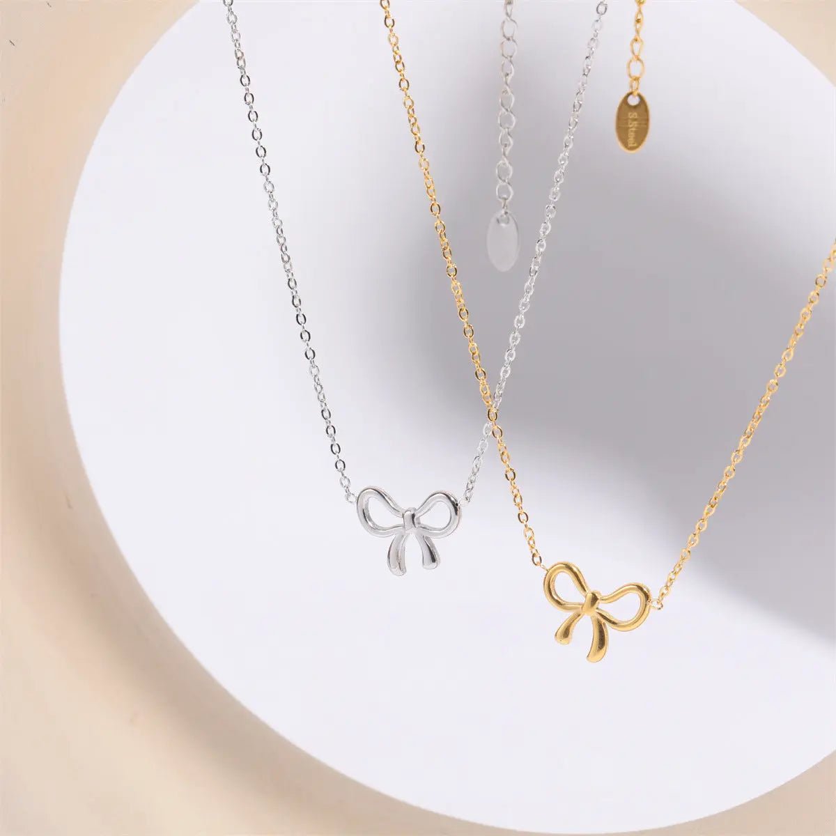 Titanium Steel Bow Pendant Necklace - GlossiChic Collectionjewelry