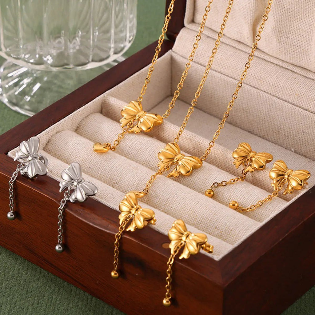 Titanium Steel Gold - Plated Bow Pendant Necklace - GlossiChic Collectionjewelry