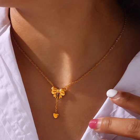 Titanium Steel Gold - Plated Bow Pendant Necklace - GlossiChic Collectionjewelry