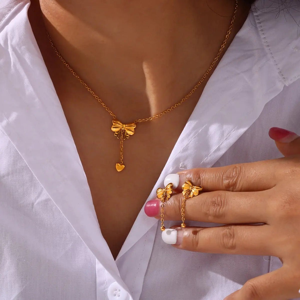 Titanium Steel Gold - Plated Bow Pendant Necklace - GlossiChic Collectionjewelry